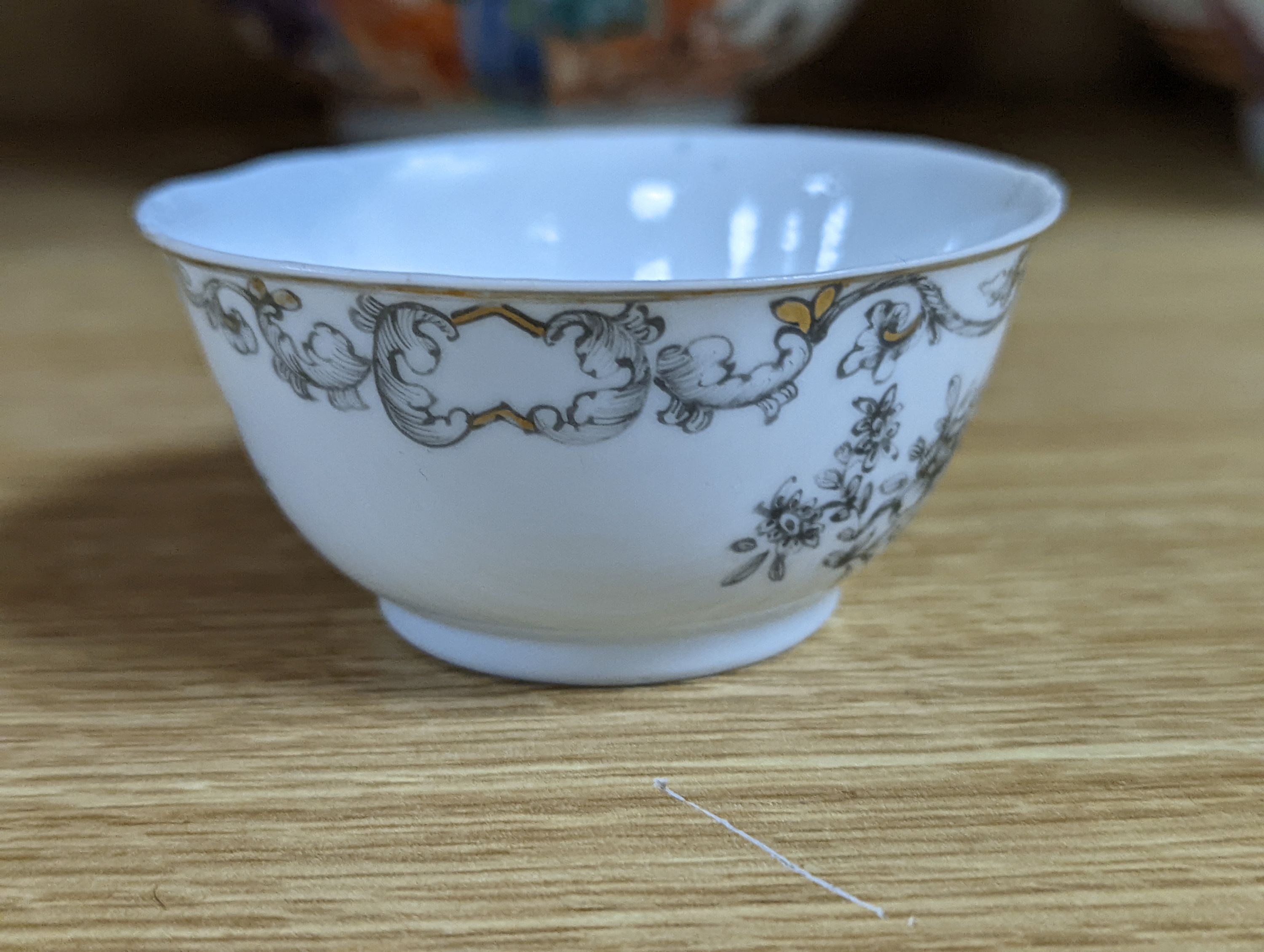 Two 18th century Chinese export bowls, a similar tea bowl and another Chinese blue and white tea bowl, largest 20cm diameter